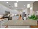 Spacious kitchen featuring granite counters, stainless appliances, and a breakfast bar at 315 Clubview Rd, Summerville, SC 29485