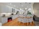 Kitchen featuring a breakfast bar with seating, custom cabinets, and hardwood floors at 315 Clubview Rd, Summerville, SC 29485