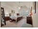 The main bedroom features neutral walls, vaulted ceilings, a ceiling fan, and a picturesque window at 315 Clubview Rd, Summerville, SC 29485