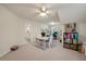 Spacious home office with carpet flooring, storage shelving, and natural light at 315 Clubview Rd, Summerville, SC 29485