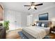 Cozy bedroom with ceiling fan, double closets, and a soothing color scheme at 317 Sabal Palmetto Ct, Moncks Corner, SC 29461