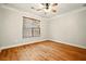 Empty bedroom with hardwood floors and neutral paint at 317 Sabal Palmetto Ct, Moncks Corner, SC 29461