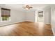 Expansive bedroom with neutral paint, hardwood floors and bright windows at 317 Sabal Palmetto Ct, Moncks Corner, SC 29461
