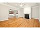 Living room featuring hardwood floors and fireplace at 317 Sabal Palmetto Ct, Moncks Corner, SC 29461