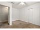 Bedroom featuring neutral walls, plush carpet, ceiling fan, and closet at 323 Amy Dr, Goose Creek, SC 29445
