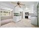 Kitchen featuring white cabinets, stainless steel appliances, and great light from the living room at 323 Amy Dr, Goose Creek, SC 29445