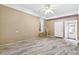 Inviting living area with tiled flooring, brick accent wall, and recessed lighting at 323 Amy Dr, Goose Creek, SC 29445