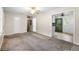 The living room offers a ceiling fan and neutral walls, leading to additional rooms at 323 Amy Dr, Goose Creek, SC 29445