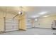 Spacious two-car garage offering ample storage and convenience at 334 Cicadas Song Dr, Moncks Corner, SC 29461