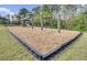 Community playground area featuring swings, slides, and play structure at 334 Cicadas Song Dr, Moncks Corner, SC 29461