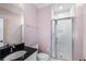 Updated bathroom featuring a glass-enclosed shower, sleek vanity, and modern fixtures in a soothing color palette at 3426 Acorn Drop Ln, Johns Island, SC 29455