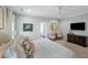 Comfortable bedroom featuring a queen-size bed, soft lighting, and stylish decor at 3426 Acorn Drop Ln, Johns Island, SC 29455