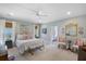 Light and airy bedroom featuring a large bed, soft colors, and elegant decor at 3426 Acorn Drop Ln, Johns Island, SC 29455