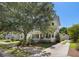 Charming two-story home with a well-manicured lawn and a detached two-car garage at 3426 Acorn Drop Ln, Johns Island, SC 29455
