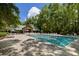 A community pool with several lounge chairs underneath a covered shelter at 3426 Acorn Drop Ln, Johns Island, SC 29455