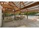 Open air pool shelter with picnic tables near the pool area at 3426 Acorn Drop Ln, Johns Island, SC 29455
