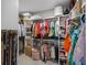 Organized walk-in closet with shelving, hanging rods, and baskets for storage, maximizing space and style at 3426 Acorn Drop Ln, Johns Island, SC 29455