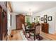 Elegant dining room with hardwood floors, chandelier, and antique furnishings at 36 Nicholson St, Charleston, SC 29407