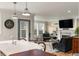 Inviting living room featuring stylish decor, shiplap walls, fireplace, and comfortable seating at 36 Nicholson St, Charleston, SC 29407