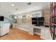 Bright and airy office with wood paneled accent wall and two built-in desks at 36 Nicholson St, Charleston, SC 29407