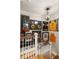 Second floor staircase with sports and music memorabilia at 36 Nicholson St, Charleston, SC 29407