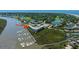 Impressive aerial view highlighting the coastal condo's waterfront location with boat docks at 3701 Docksite Rd # 220, Edisto Island, SC 29438
