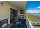 Charming balcony with seating offers stunning views of the marina and waterfront at 3701 Docksite Rd # 220, Edisto Island, SC 29438