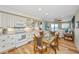 Inviting dining area with seating for four and waterfront views at 3701 Docksite Rd # 220, Edisto Island, SC 29438