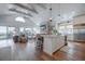 Spacious living area featuring open concept design, hardwood floors, and seamless indoor-outdoor flow at 3803 Palm Blvd, Isle of Palms, SC 29451