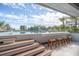 Stunning outdoor swimming pool with a view and stool seating area for entertainment at 3803 Palm Blvd, Isle of Palms, SC 29451