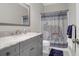 Bathroom featuring a gray vanity with a marble countertop and a shower with an elephant shower curtain at 4003 Radcliffe Place Dr # B6, Charleston, SC 29414