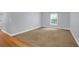 Bedroom featuring carpet, neutral walls, white trim and natural light from window at 4003 Radcliffe Place Dr # B6, Charleston, SC 29414
