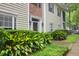 Beautifully landscaped exterior with mature plantings and inviting entrance to the home at 4003 Radcliffe Place Dr # B6, Charleston, SC 29414