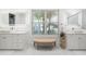 Bright bathroom with double vanity, lighted mirrors and great natural light at 4009 E Amy Ln, Johns Island, SC 29455