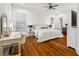 Elegant bedroom with wood floors, ample natural light, and vanity at 4009 E Amy Ln, Johns Island, SC 29455