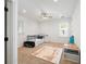 Bright bedroom with neutral carpet, ceiling fan, and play area rug at 4009 E Amy Ln, Johns Island, SC 29455