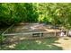 Well-maintained dog park enclosed by a fence with benches and shade for owners and their pets at 4009 E Amy Ln, Johns Island, SC 29455