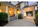 Inviting covered front porch, carport, and driveway, and a charming staircase entrance at 4009 E Amy Ln, Johns Island, SC 29455