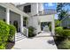 Inviting covered front porch, carport, and driveway, and a charming staircase entrance at 4009 E Amy Ln, Johns Island, SC 29455