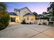 Back of home featuring a patio, carport, and a charming circular window at 4009 E Amy Ln, Johns Island, SC 29455