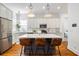 Gourmet kitchen with large island, stainless steel appliances, and stylish pendant lights at 4009 E Amy Ln, Johns Island, SC 29455