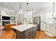 Open-concept kitchen with an island, stainless steel appliances, and hardwood floors at 4009 E Amy Ln, Johns Island, SC 29455