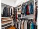 Organized walk-in closet with custom shelving and ample storage space at 4009 E Amy Ln, Johns Island, SC 29455