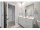 Bright bathroom features double sinks, tile floor, and a walk-in closet at 4129 Maidstone Dr, Mount Pleasant, SC 29466