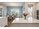 Dining area with lots of natural light, a modern light fixture, and view of the backyard at 4129 Maidstone Dr, Mount Pleasant, SC 29466