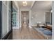 Inviting entryway with hardwood floors and modern lighting fixtures to welcome guests into the home at 4129 Maidstone Dr, Mount Pleasant, SC 29466