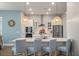 Bright kitchen featuring stainless steel appliances, white cabinets, quartz counters, and pendant lighting at 4129 Maidstone Dr, Mount Pleasant, SC 29466