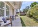 Cozy back patio with outdoor seating, a privacy fence, and lovely landscaping, perfect for outdoor enjoyment at 4235 Scharite St, Charleston, SC 29414