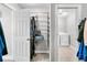 Walk-in closet with shelving, providing ample storage; laundry room in the adjacent room at 4235 Scharite St, Charleston, SC 29414