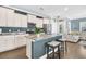 Granite island overlooking the living room providing an open layout for entertaining at 4235 Scharite St, Charleston, SC 29414